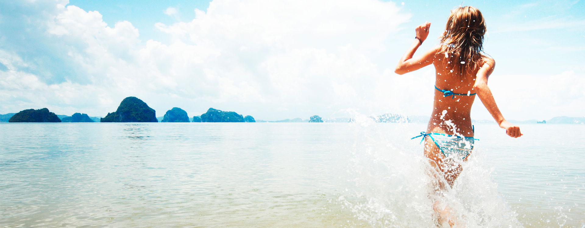 Woman Running in Sea